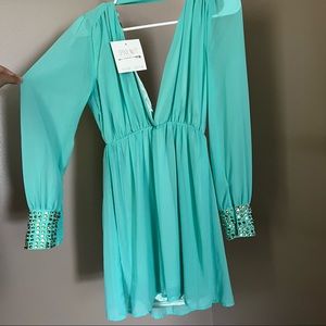 Long sleeve deep v neck dress with gems